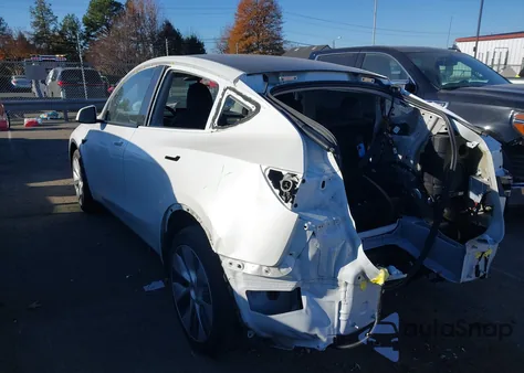 2023 Tesla Model Y Awd/Long Range Dual Motor All-Wheel Drive z USA, uszkodzony, nr VIN 7SAYGDEE7PA035771